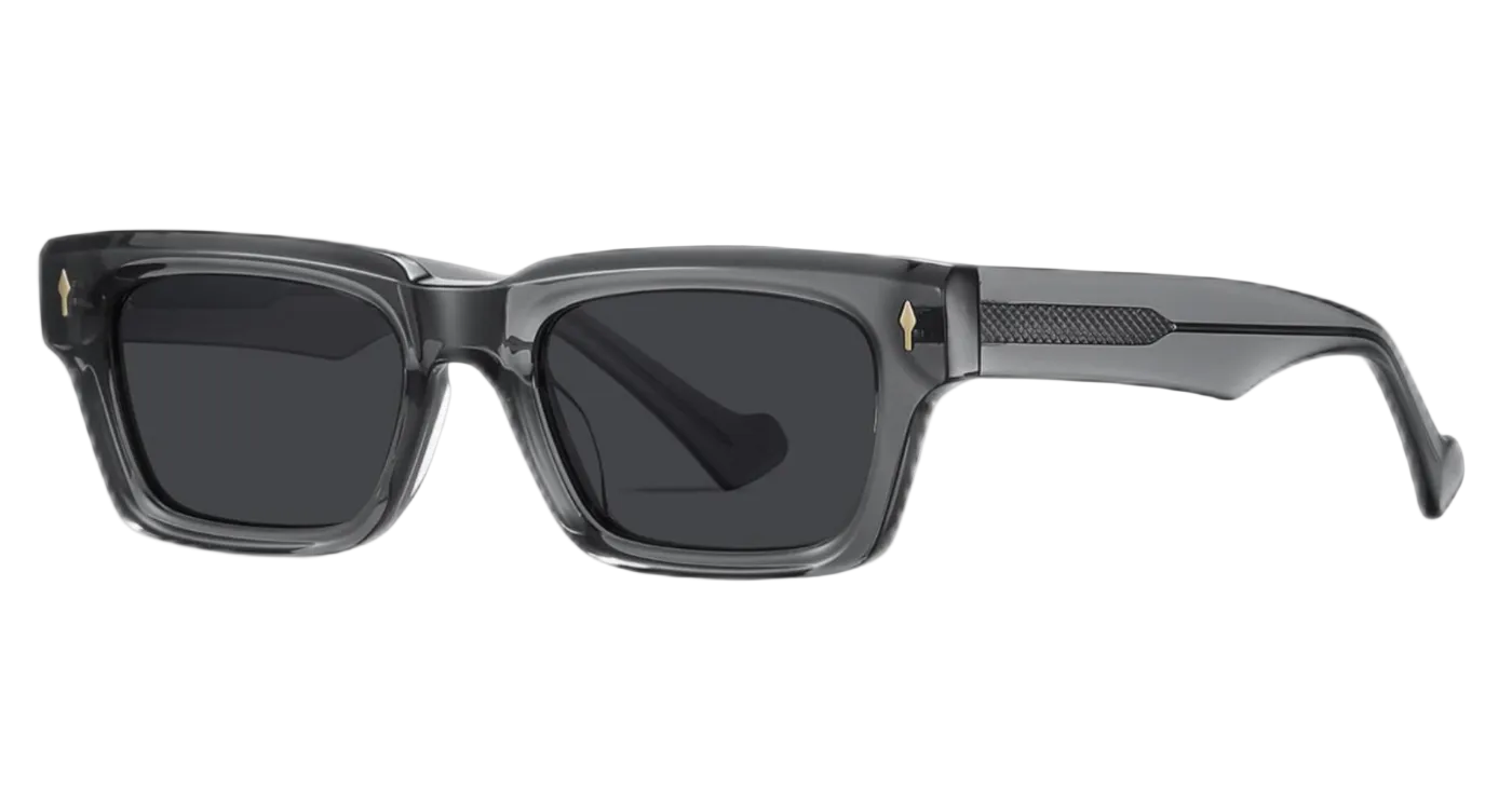 Black acetate UV 400 Polarised sunglasses with black lenses and small gold diamond-shaped accents on the transparent greyl temples, shown against a plain white background by missandtrendy