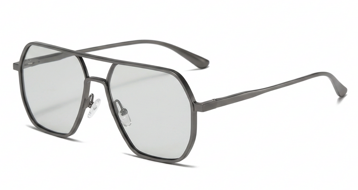A pair of angular aviator-style photochomic UV polarised sunglasses, with a dark gray metal frame and clear lenses, shown at a three-quarter angle on a white background.
