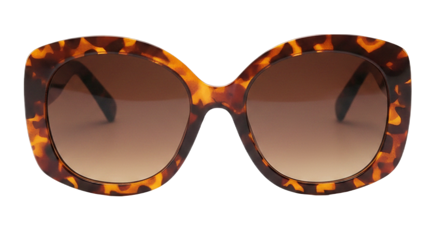 Woman wearing Diva tortoiseshell frame and brown lens oversized polarised sunglasses by Missandtrendy 0º side view