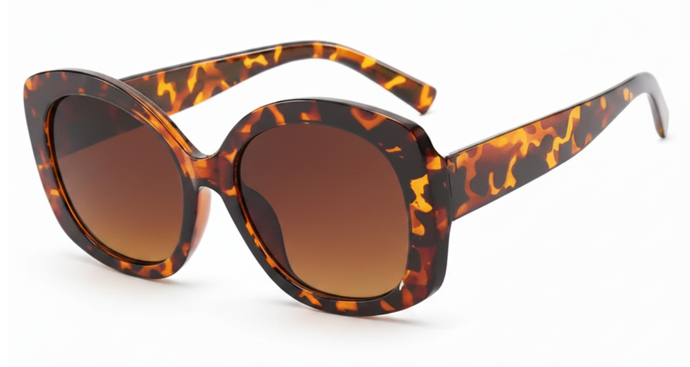 Diva tortoiseshell frame and brown lens oversized polarised sunglasses by Missandtrendy 45º side view.