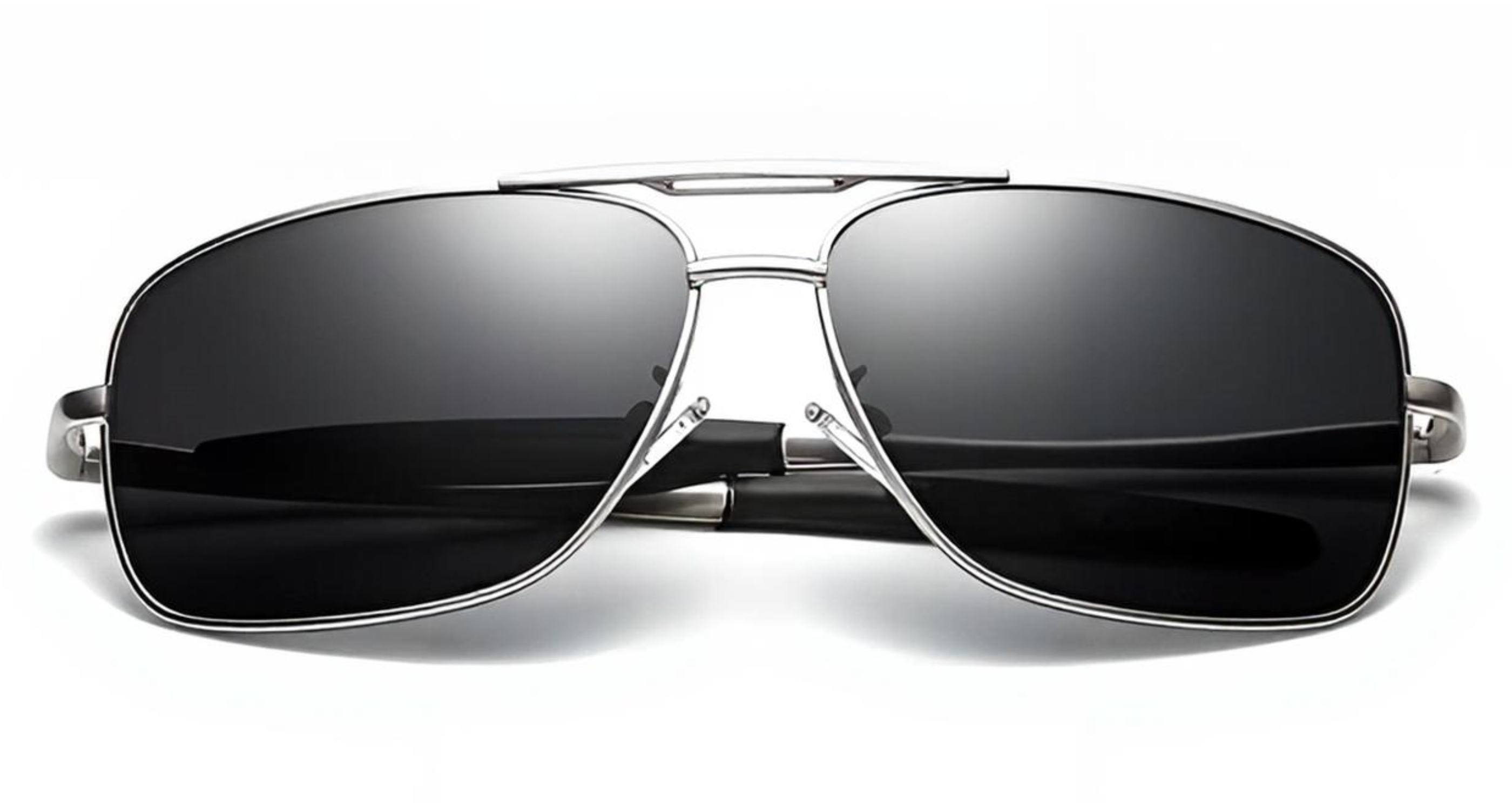 Liverpool - A pair of men's aviator UV 400 polarised sunglasses with a silver-tone metal frame and dark tinted lenses, shown against a plain white background - Missandtrendy