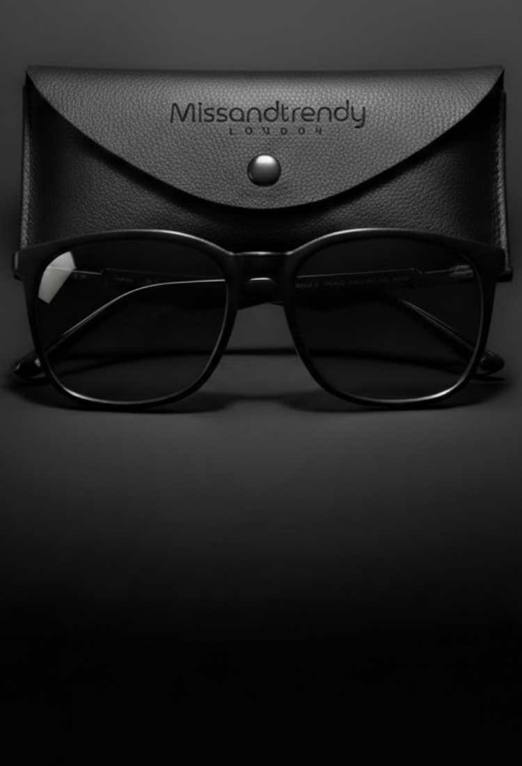 Black on black London style UV Polarised Wayfarer sunglasses and a leather black envelop sunglasses case with Missandtrendy logo printed on a luxurious dark moody background