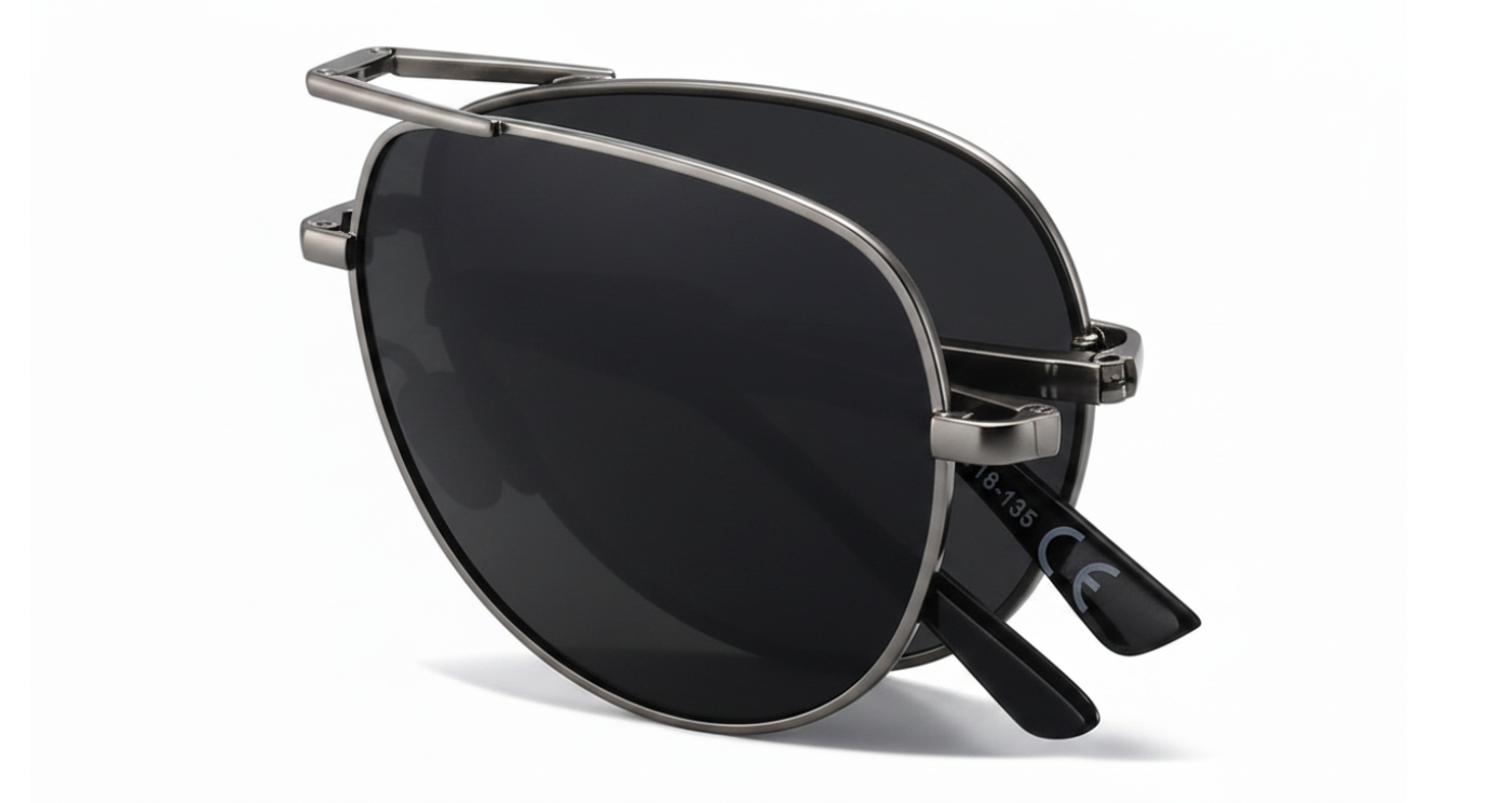 A pair of modern folding aviator-style eyeglasses with a thin silver-tone metal frame, black lenses, and black temple tips, shown on a clean white background by Missandtrendy