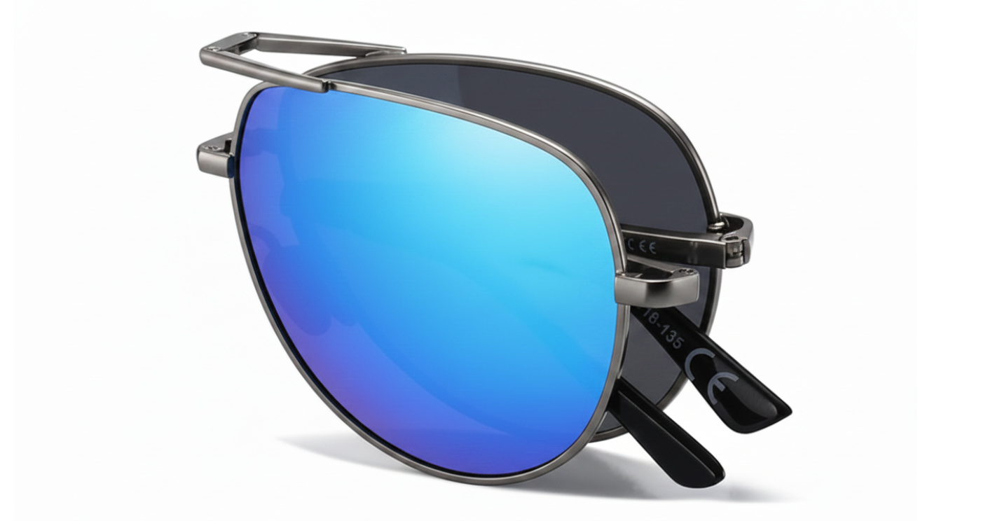 A pair of modern folding aviator-style eyeglasses with a thin silver-tone metal frame, mirror blue lenses, and black temple tips, shown on a clean white background by Missandtrendy