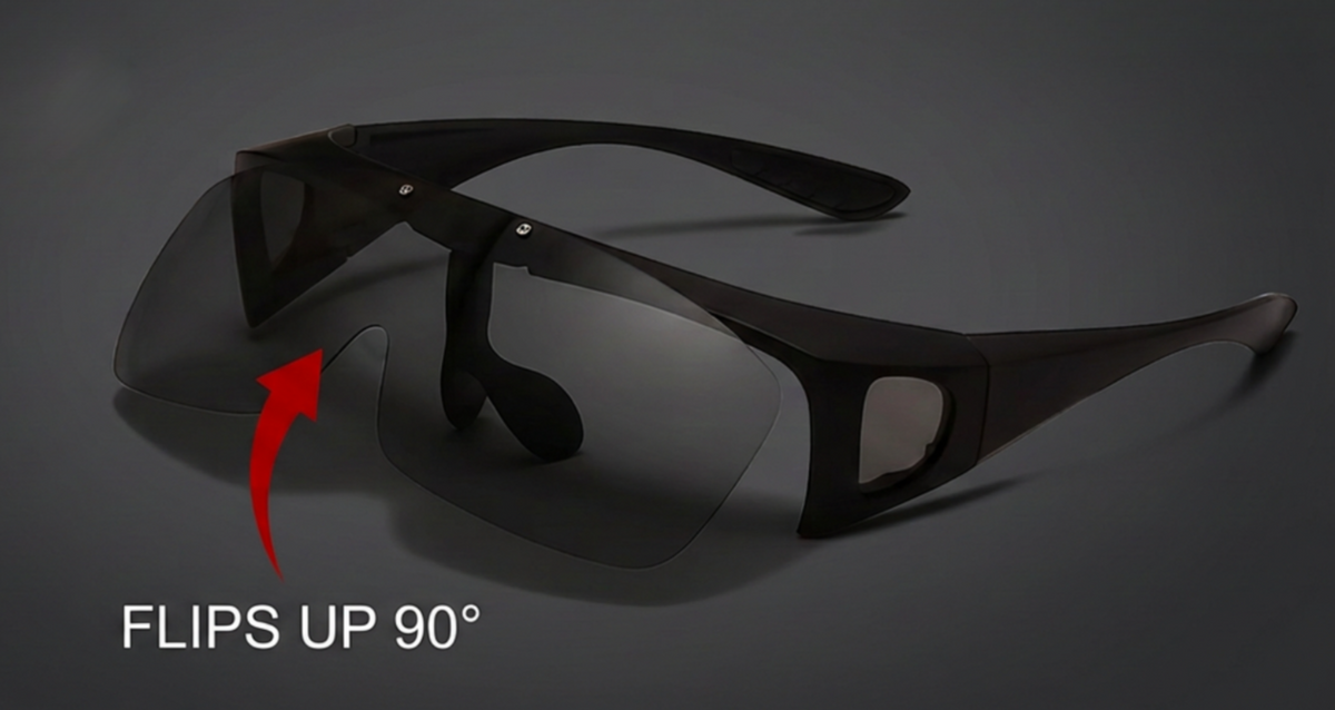 Black Photochromic UV 400 Polarised sunglasses with a flip-up photochromic uv polarised  lens design, shown on a dark gray background with a red arrow and text reading 'FLIPS UP 90°'.