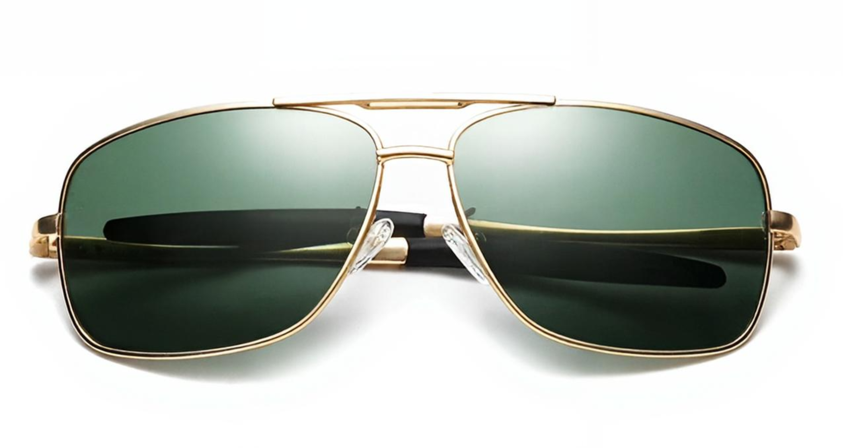 Liverpool - A pair of aviator-style UV 4400 polarised sunglasses with a gold-tone metal frame and dark green tinted lenses, shown from a front-facing perspective on a clean white background - Missandtrendy