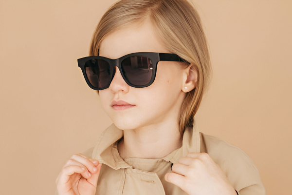 Girl model teen wearing black sunglasses with dark lenses from Missandtrendy UK