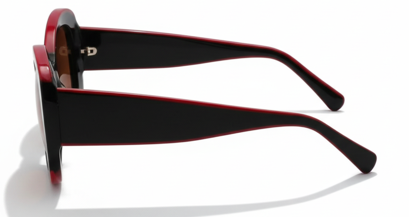 Woman wearing Diva burgundy frame and brown lens oversized polarised sunglasses by Missandtrendy 90º side view new_01