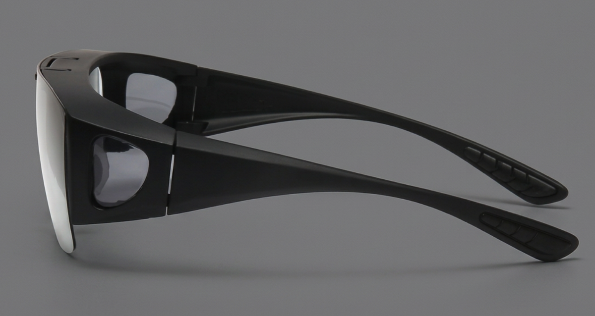 Black wrap-around 3D Photochromic UV 400 Polarised Sunglasses with a glossy matte finish, shown from a side profile view against a solid gray background.