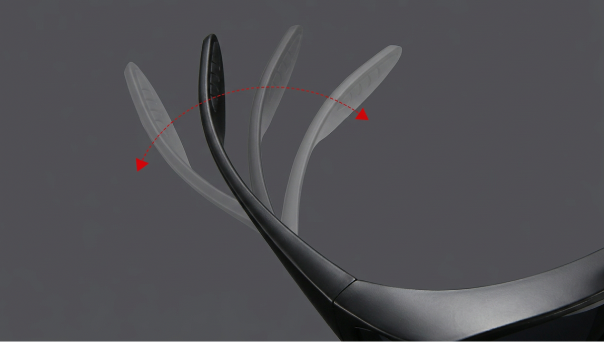 Close-up of a black curved wearable device with translucent leaf-shaped sensors or lenses, shown on a dark gray background with a red dashed arrow indicating movement or rotation.